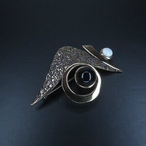 Gold Pin with Black and White Stone Accents